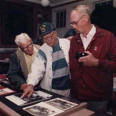 A photo view of three WW II vets. 8/12/1991.