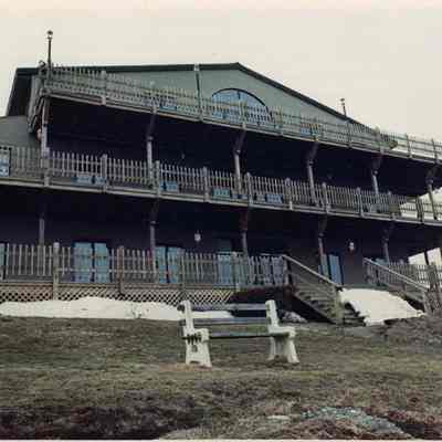 A photo view of a fancy building on the coast.
