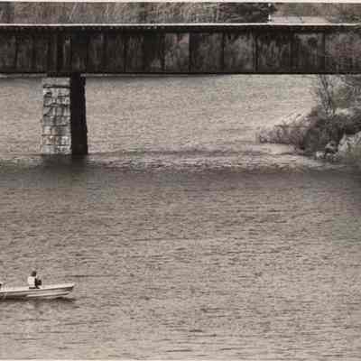 A photo view of 2 people fishing on the Androscoggin River. 4/24/1992.