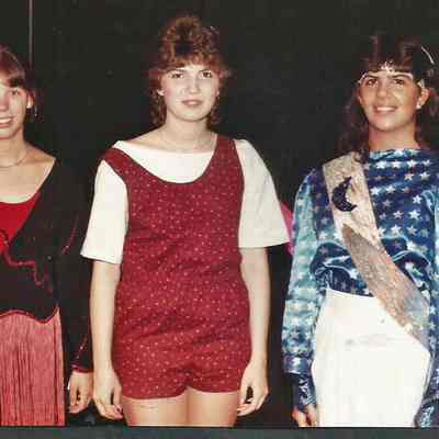A color photograph of 3 contestants.