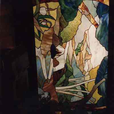 A photo view of a stain glass window. 2/23/1990.