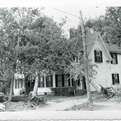 Corner of Cumberland and Cushing Streets after hurricane, 1954