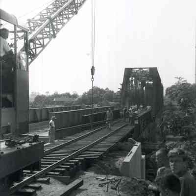 A photo of repairs being done to the Black Bridge.