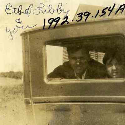 A photo of I. Whitney, M. Thomas & E. Williams in a car.