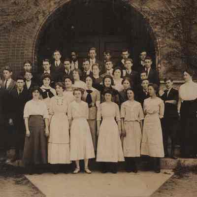 A photo of a group of students in front of school. 1914