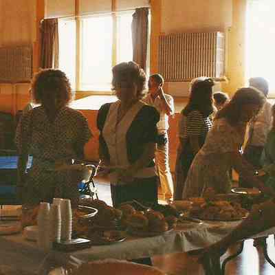 Darby Labbe, Robin Moody, Jodi Labrie and Stacy Bean getting food.