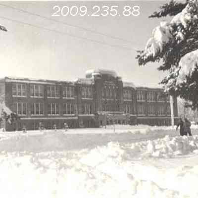 A photo of the Brunswick High School buried in snow.