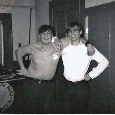 A B/W photograph of 2 men.