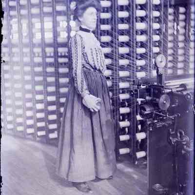 A woman working in a factory.
