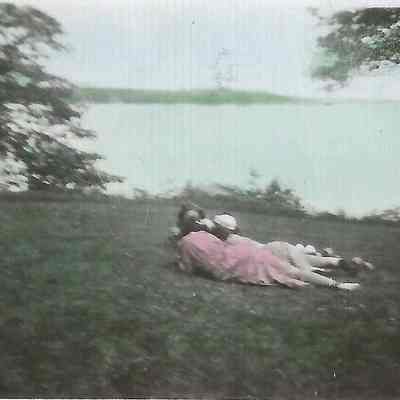 Three Unknown Women Lying on a Lawn