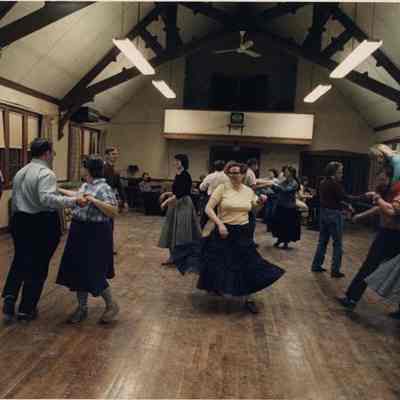 A photo view of a group country dancing. 3/13/1989.