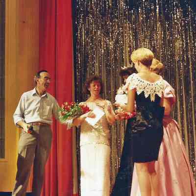 Katherine Albano presenting roses to Darby Labbe