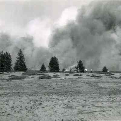 Firemen Fighting the Hillside to Base Fire