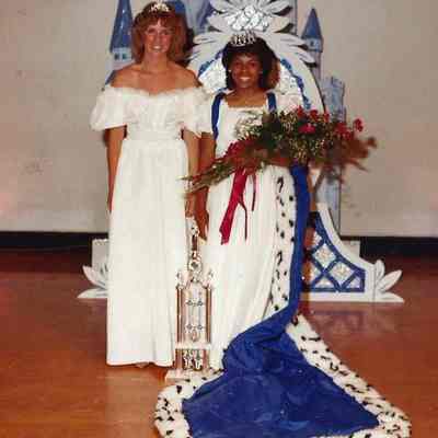 A color photograph of 1982 Brunswick Teen Queen Kathy Walters and the newly elected 1983 Teen Queen Kim Carslick.