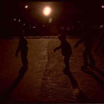 A photo view of night skating on the Mall. 12/31/1977.