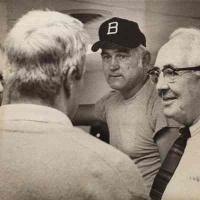 A photo view of 4 men. 10/6/1975.