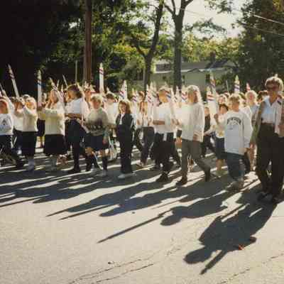 A photo of a group of kids marching in the 250th parade.10/7/1989.