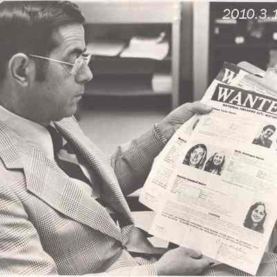 Floyd White Checks Wanted Posters