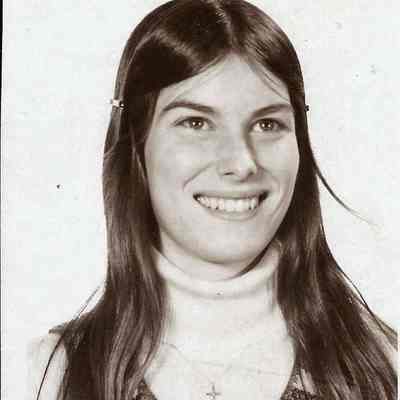 A B/W photograph of Susan DiEdwardo.