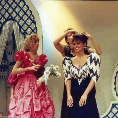 Stacy Bean crowning Miss Brunswick Katherine Albano and Robin Moody is bringing flowers.