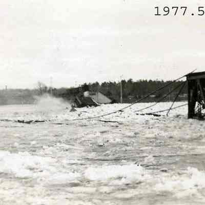 The destroyed railroad bridge during the 1936 flood.