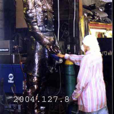 Cleaning the JL Chamberlain statue.