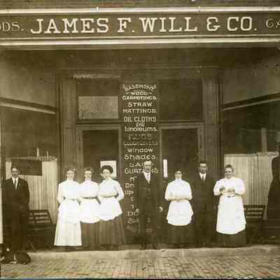 James F. Will and Co. Department storefront with employees