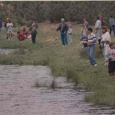 A photo view of people fishing. 6/8/1992.