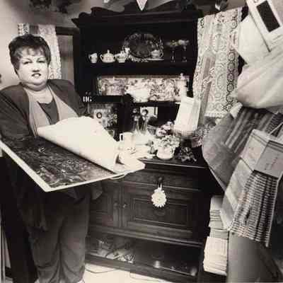 A photo view of a woman in a fabric shop. 9/16/1992.
