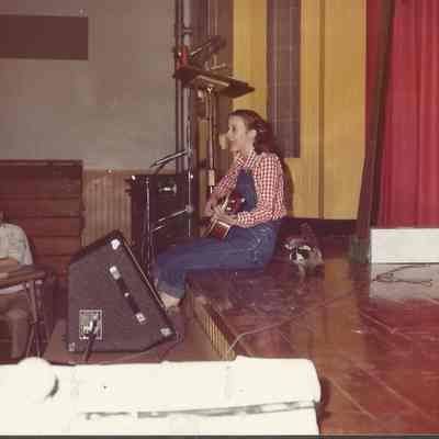 Contestant #8 Heidi Heintz while accompanying herself on the guitar singing a country tune "Bile Them Cabbage Down."