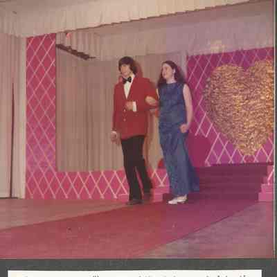 Contestant #4 Jane Thiboutot escourted to the microphone by Jim Lewis.
