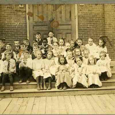 Children on steps of Center Street School.