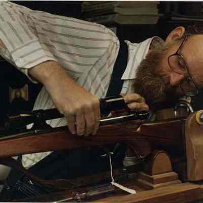 A photo view of a gunsmith at work. 10/7/1988.
