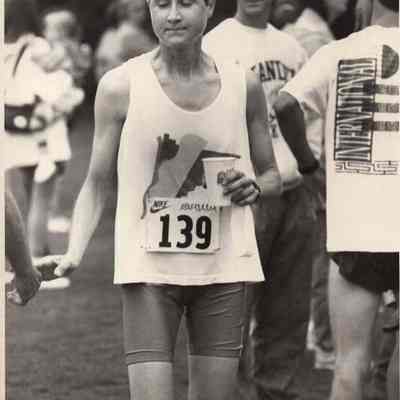 A photo view of a man running. 8/17/1992.
