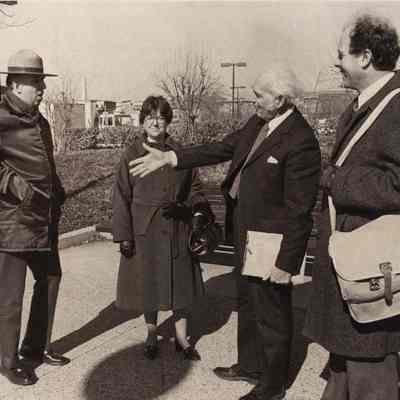 A photo view of Karl F. Heiser meeting group of people. 2//2/1981