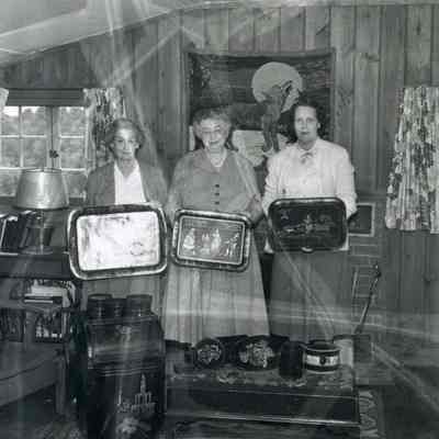 Women Holding Painted Trays