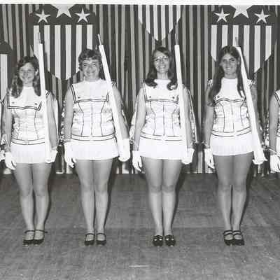 A B/W photograph of the contestant posing in costume