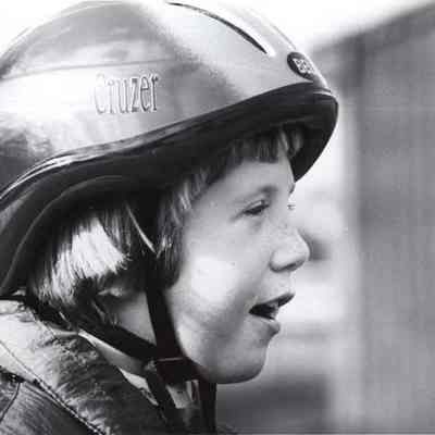 A photo view of a little girl at Flying Changes.