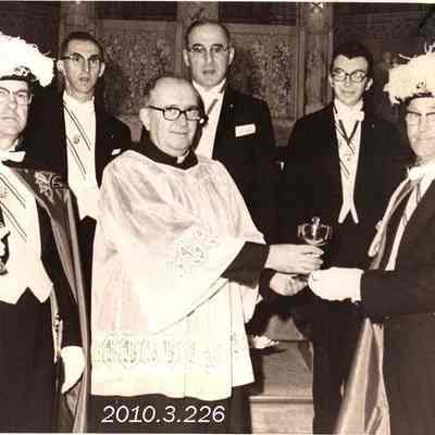 Father Leo Hall Receiving a Gift