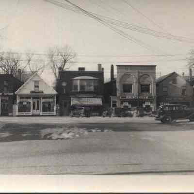 Postcard of 36-58 Maine St from Mason St