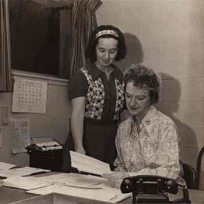 A photo view of two women.
