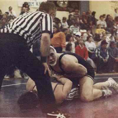 A photo view of a high school wrestling match. 2/20/1989.