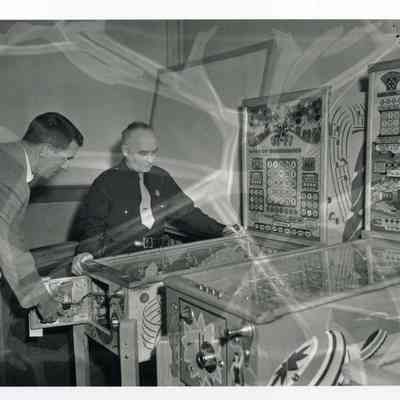 Officers Inspect Pinball Machines