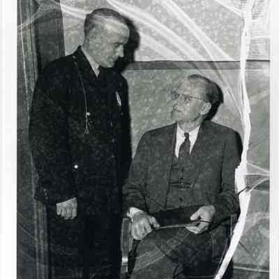 Police Chief Joel Lebel and unidentified man