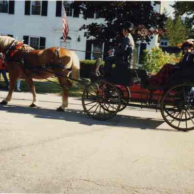 A photo of a group of a horse and carriage in the 250th parade.10/7/1989.