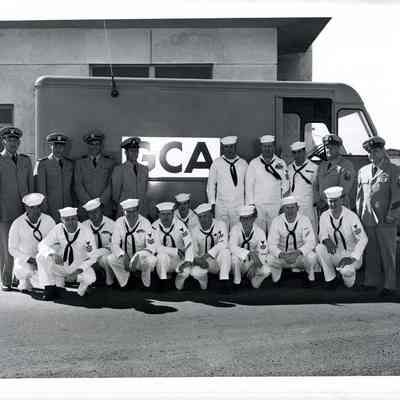 19 GCA men - Six Officers and 13 Sailors