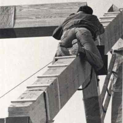 Man Climbing on a Truss