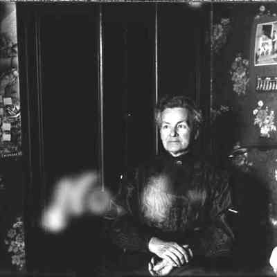 A woman sitting.