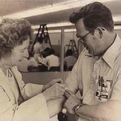 A photo view of two people. 6/22/1982.