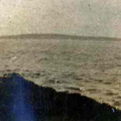 Waves Hitting the Shore Line
